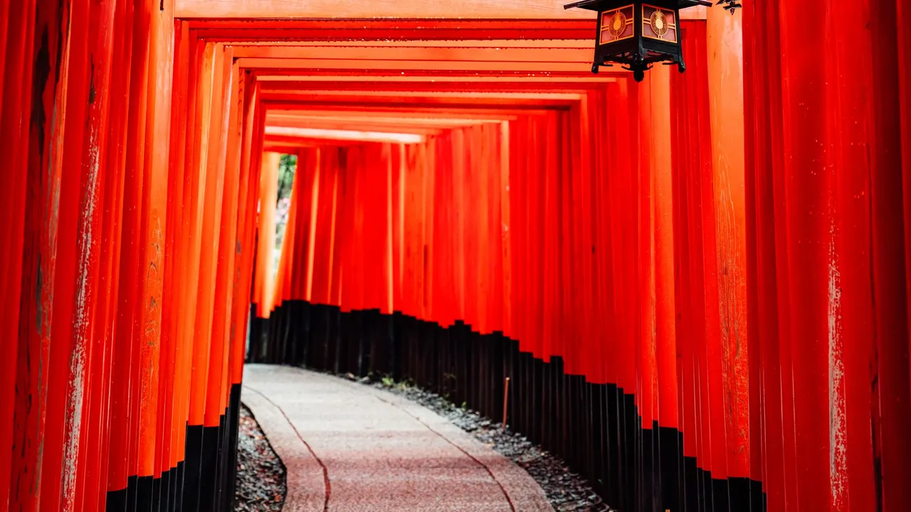 A traditional temple and torii gate in Kyoto, Japan