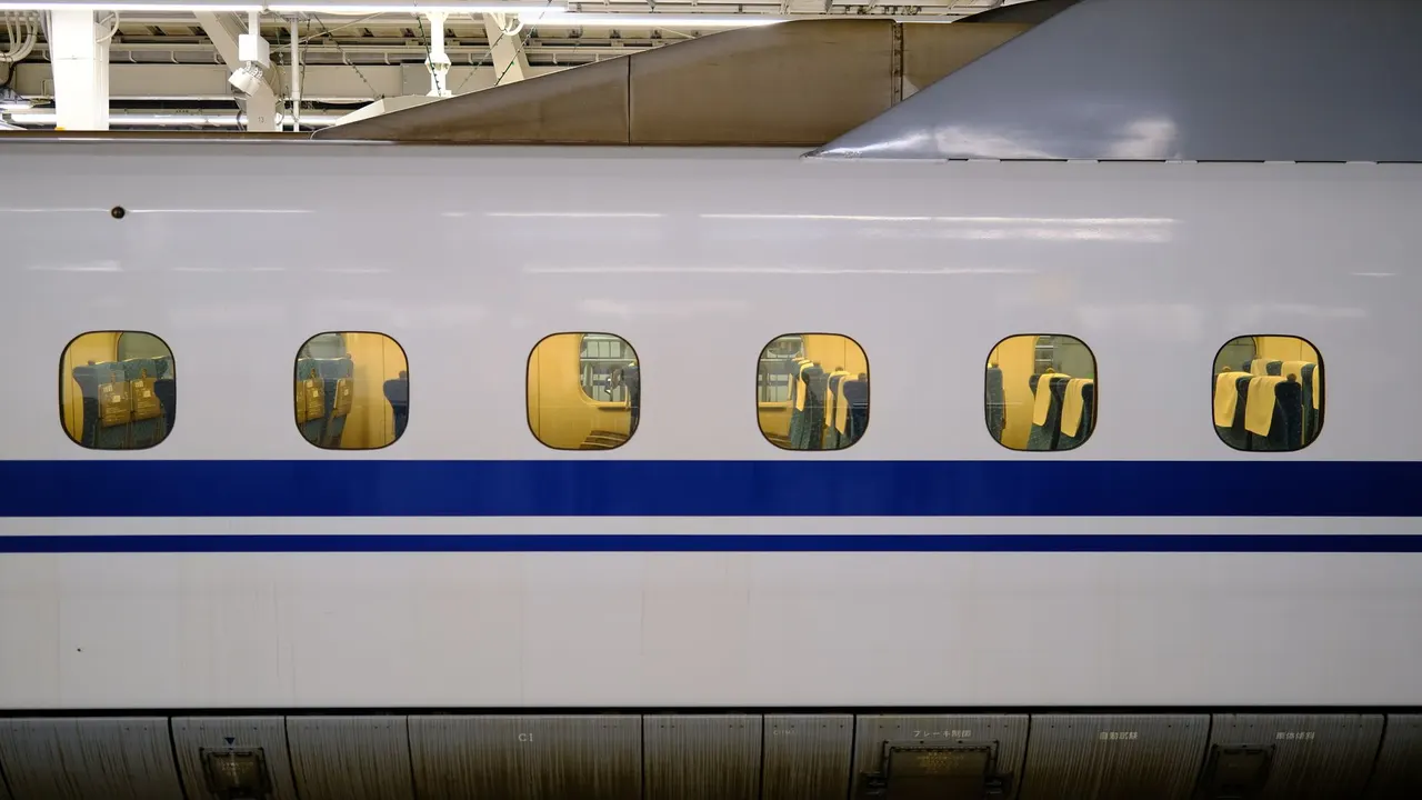 A shinkansen bullet train at a Japanese station platform