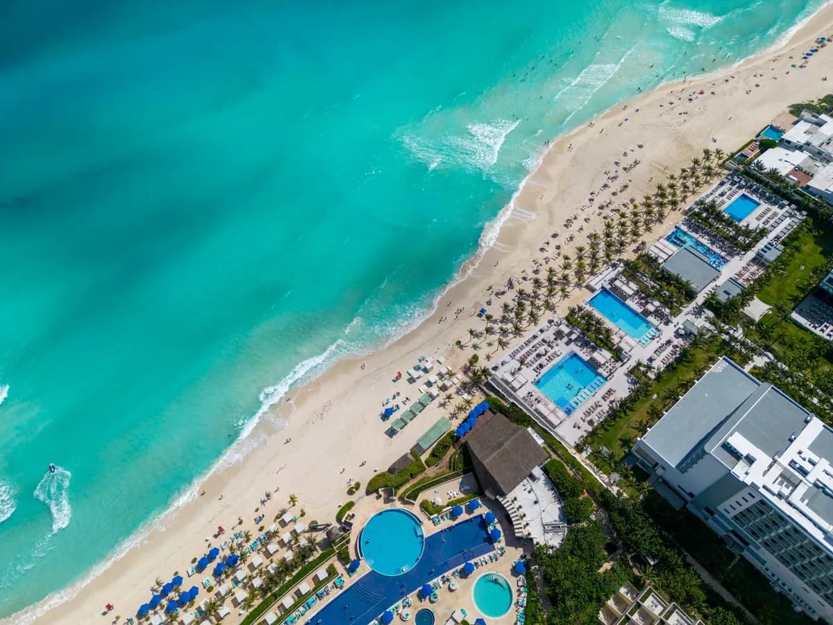 A Caribbean beach and turquoise sea in Cancún, Mexico