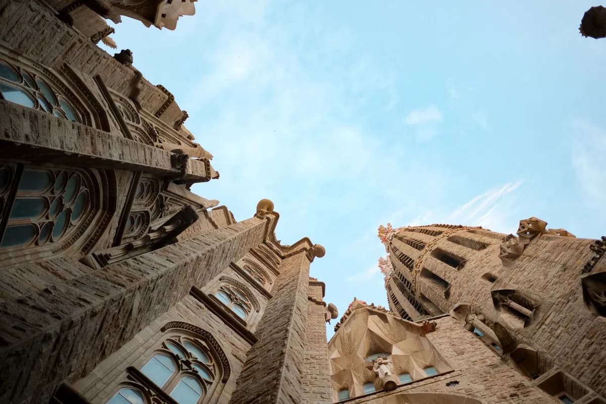 The Sagrada Família towers against a blue sky in Barcelona, Spain