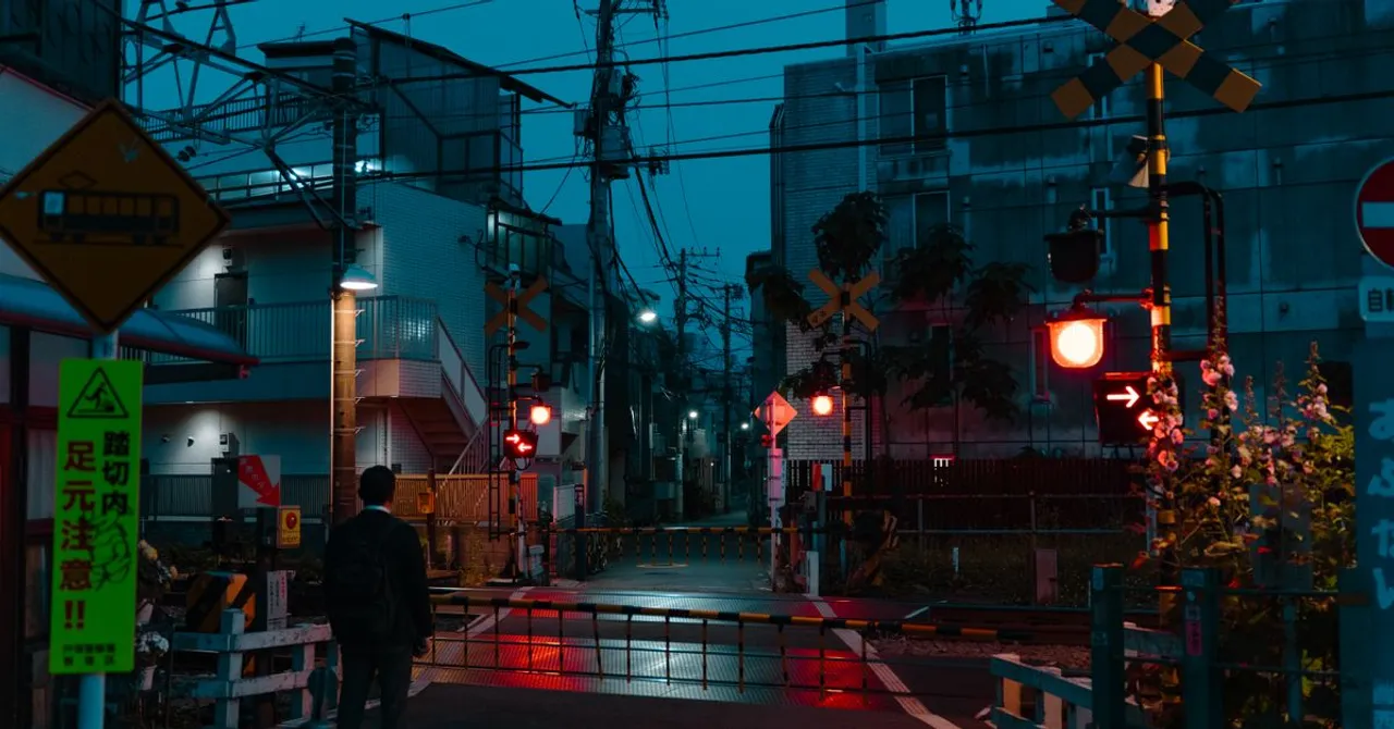 The Tokyo skyline at dusk with dense high-rise buildings stretching to the horizon